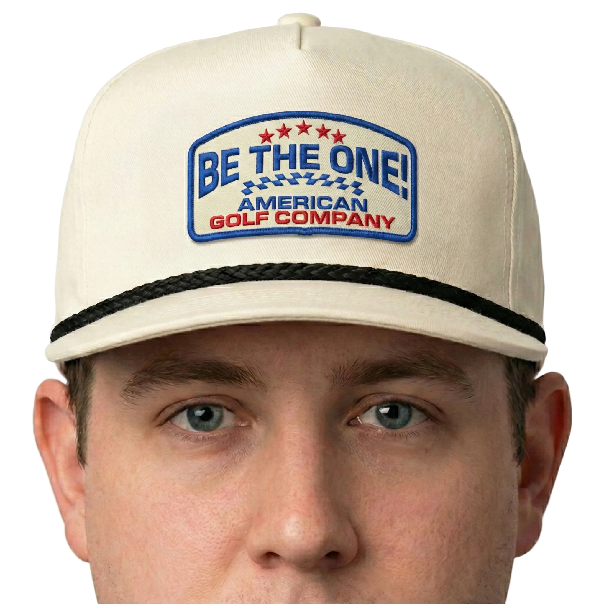Beige cap with 'Be the One! American Golf Company' logo worn by a person